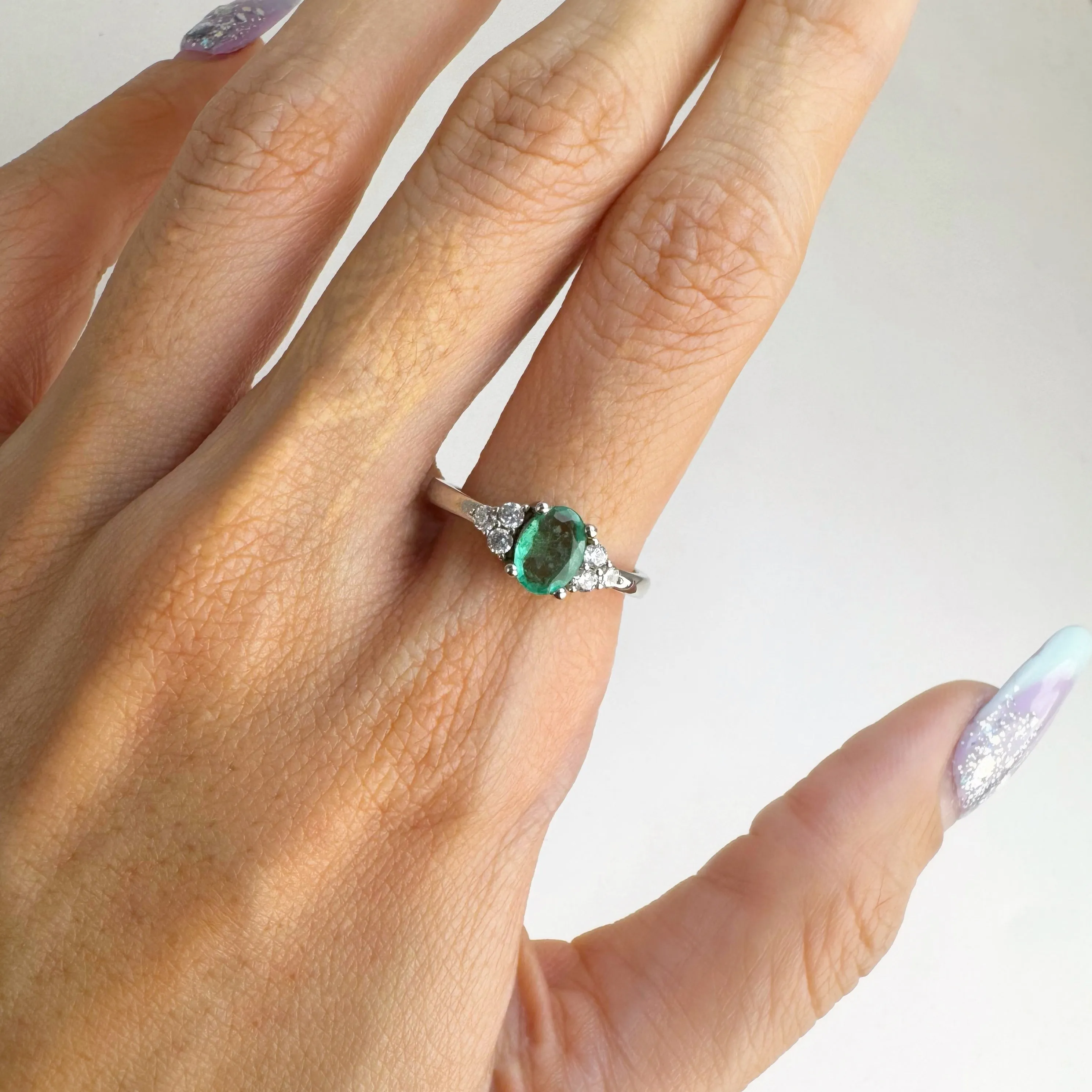 5 x 7 mm. Oval Cut Green Zambian Emerald with Cz Accents Ring