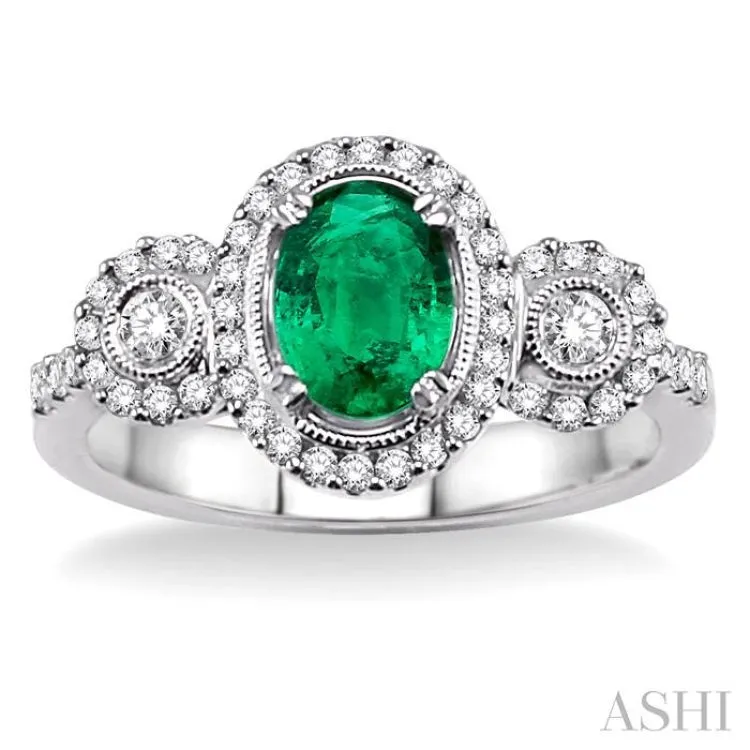 7x5MM Oval Cut Emerald and 1/2 Ctw Round Cut Diamond Ring in 14K White Gold