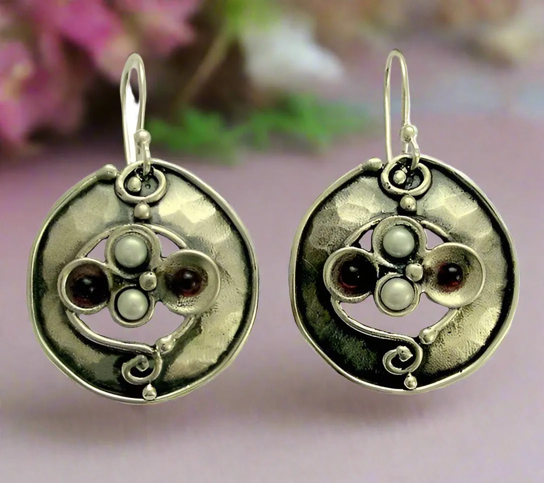 Dangle pearl garnet earrings - Free association.
