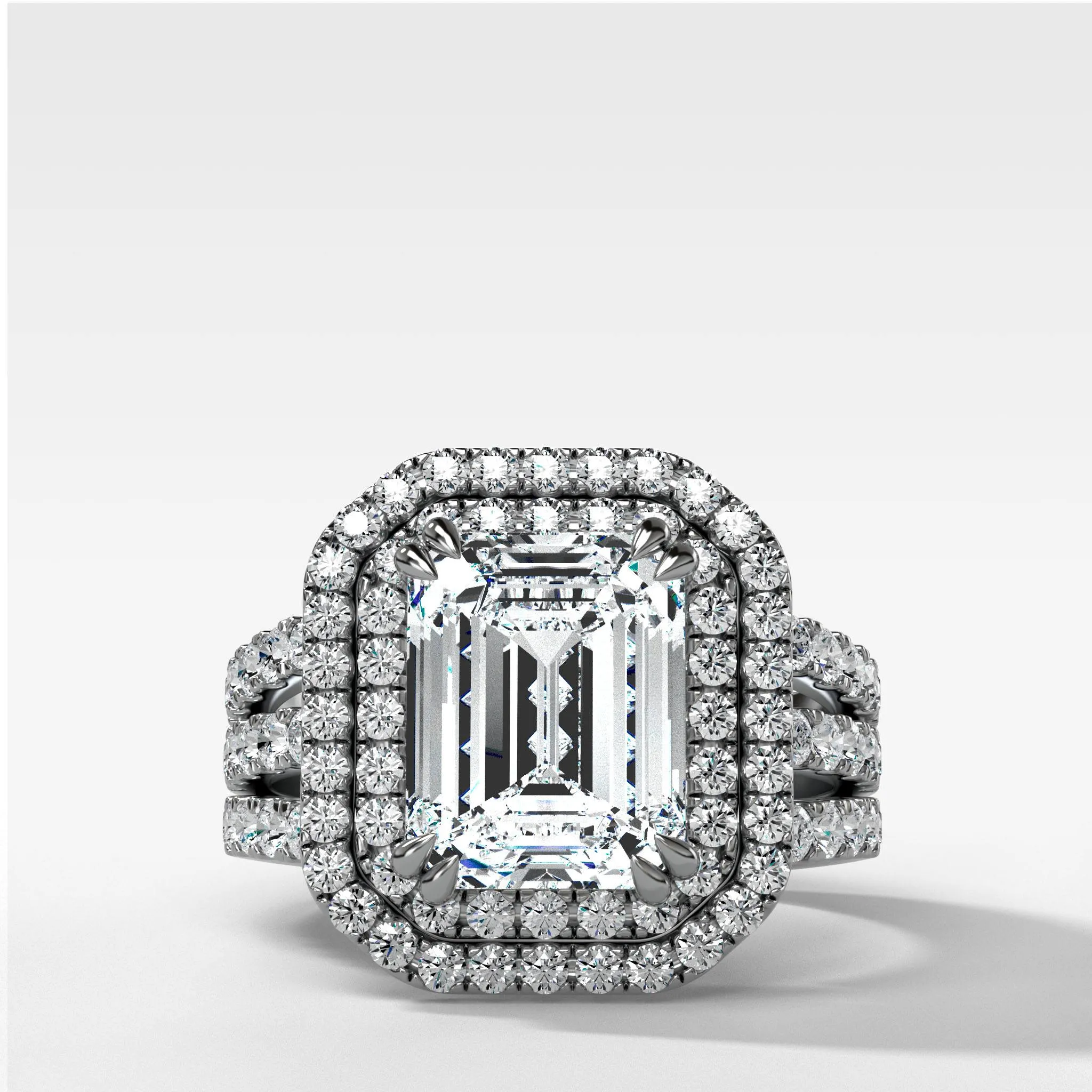 Double Halo Triple Shank Engagement Ring With Emerald Cut Diamond