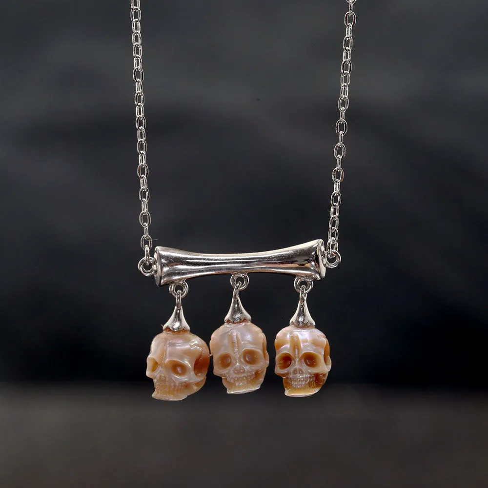 Gothic Three Stone Pearl Skulls Necklace