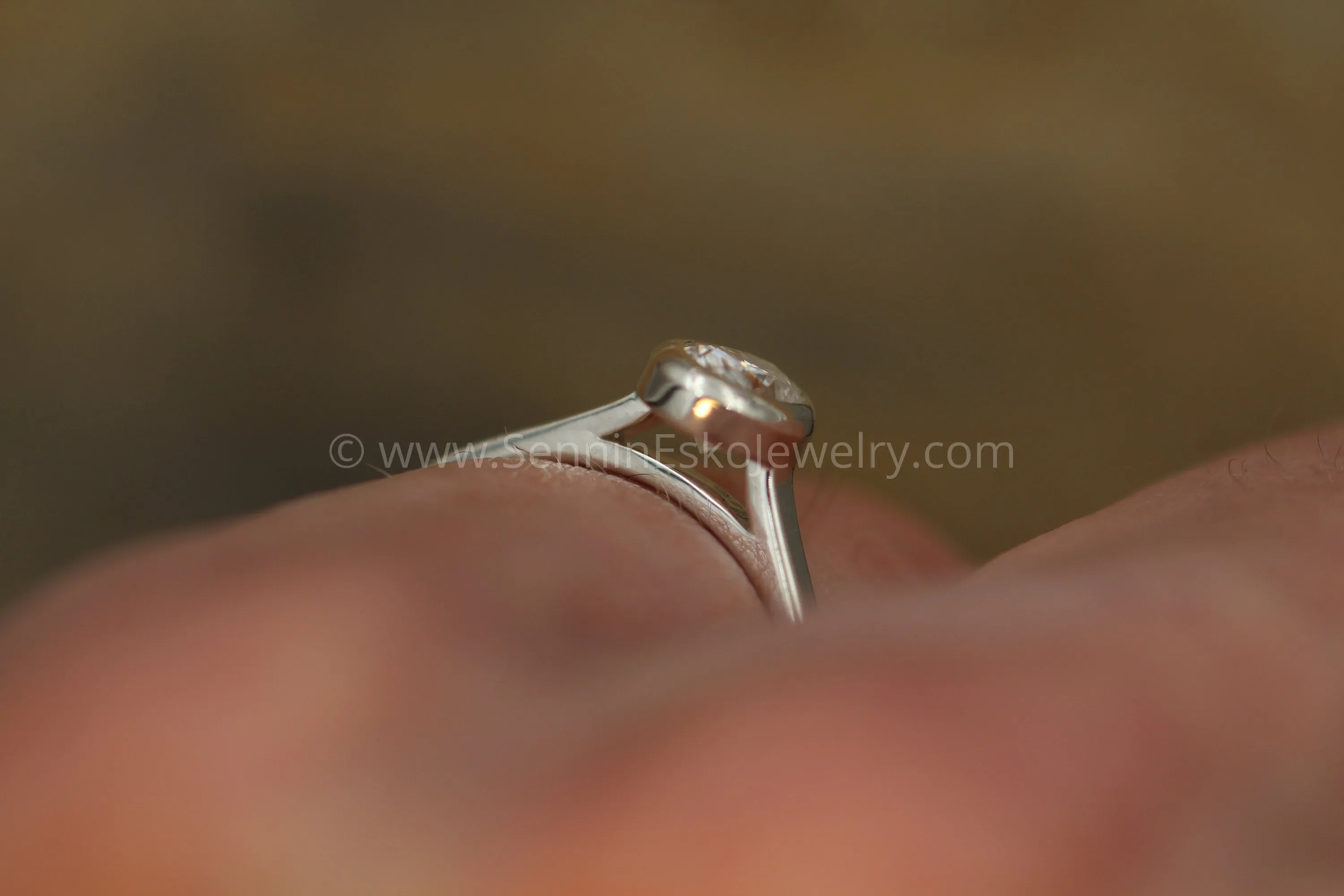 Moissanite 4x6mm Oval Peekaboo Bezel Solitaire Ring -  Forever One Moissanite