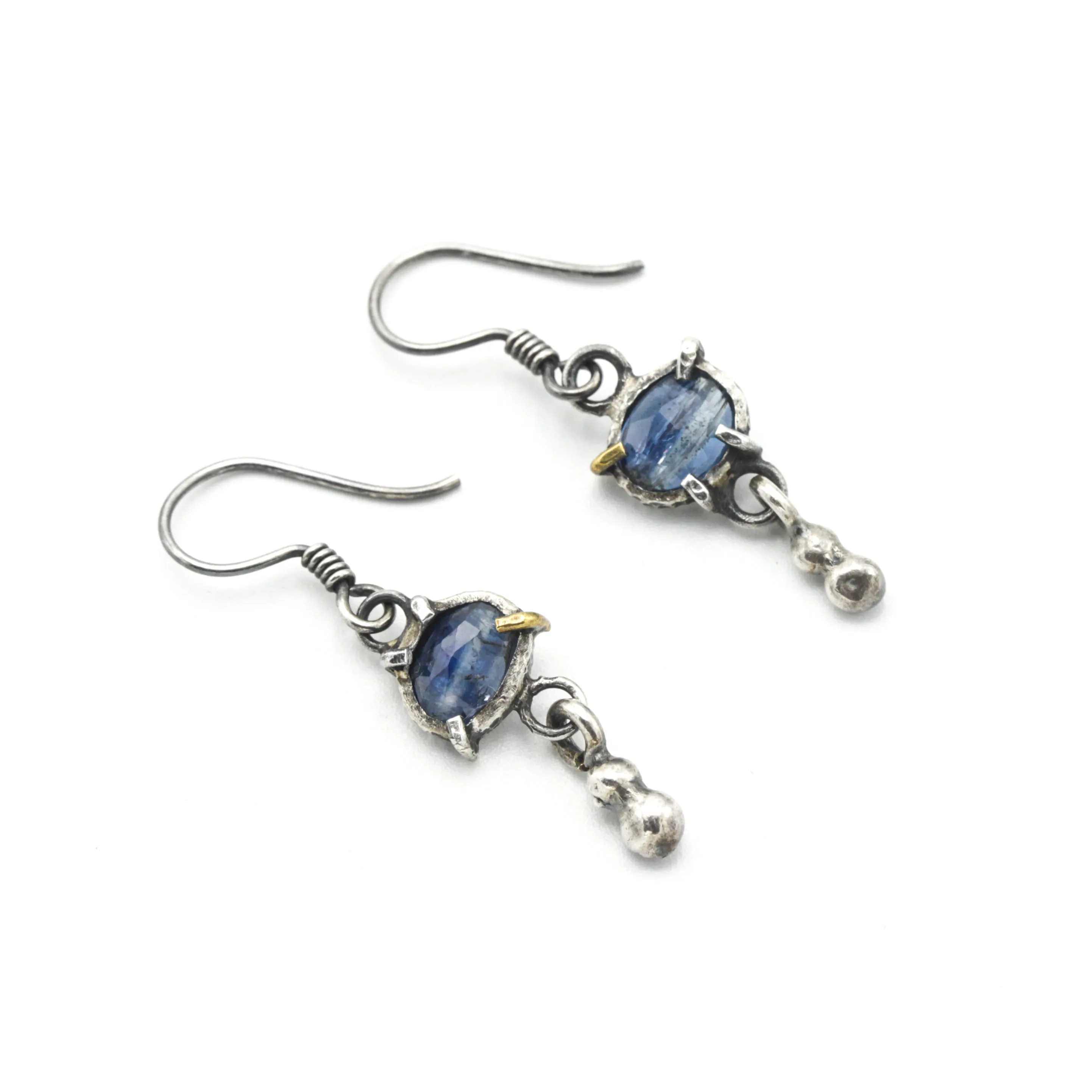 Oval blue kyanite earrings in silver bezel and prongs setting with silver beads on oxidized sterling silver hooks style