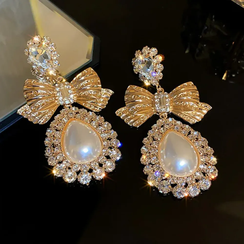 REEMA COQUETTE BOW EARRINGS