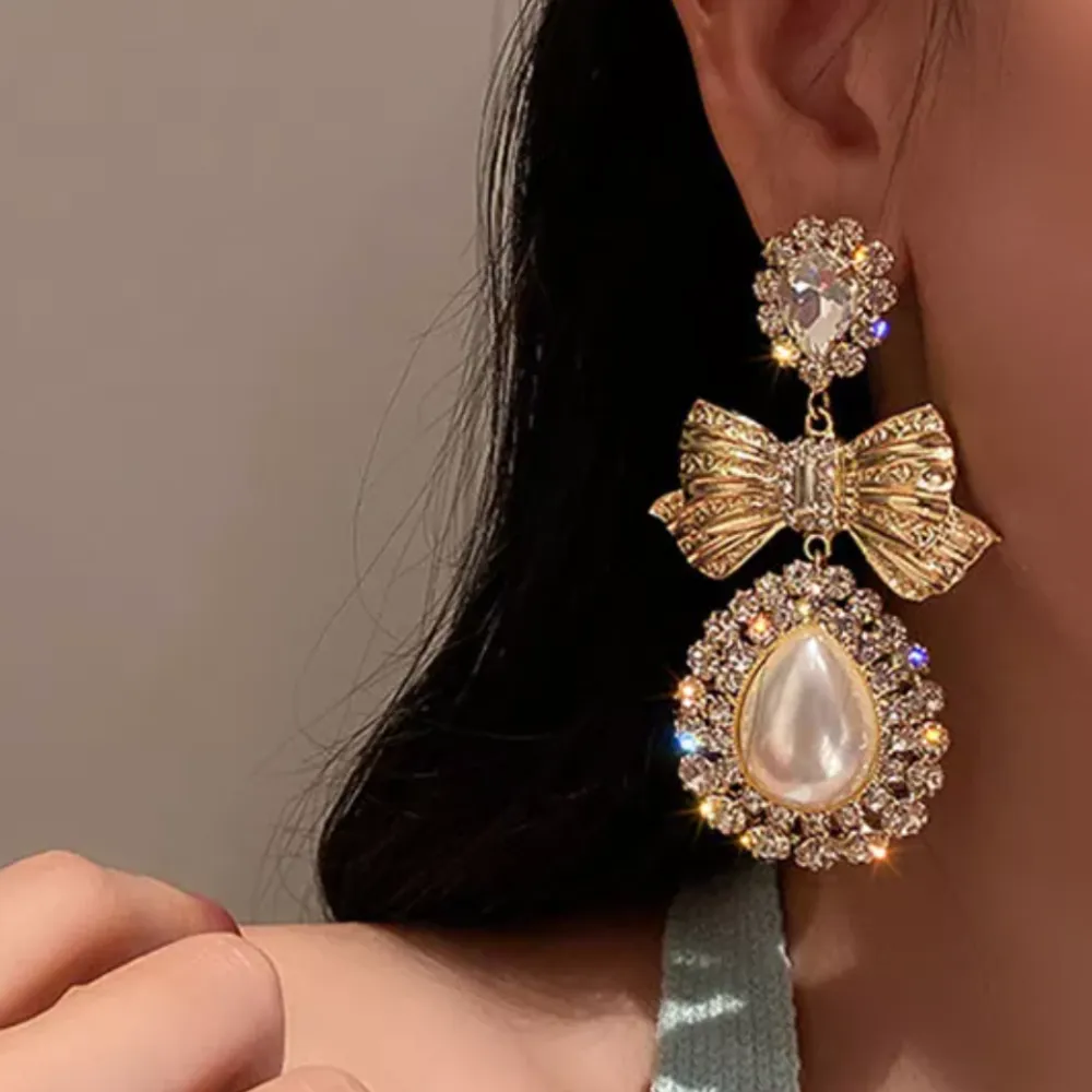 REEMA COQUETTE BOW EARRINGS