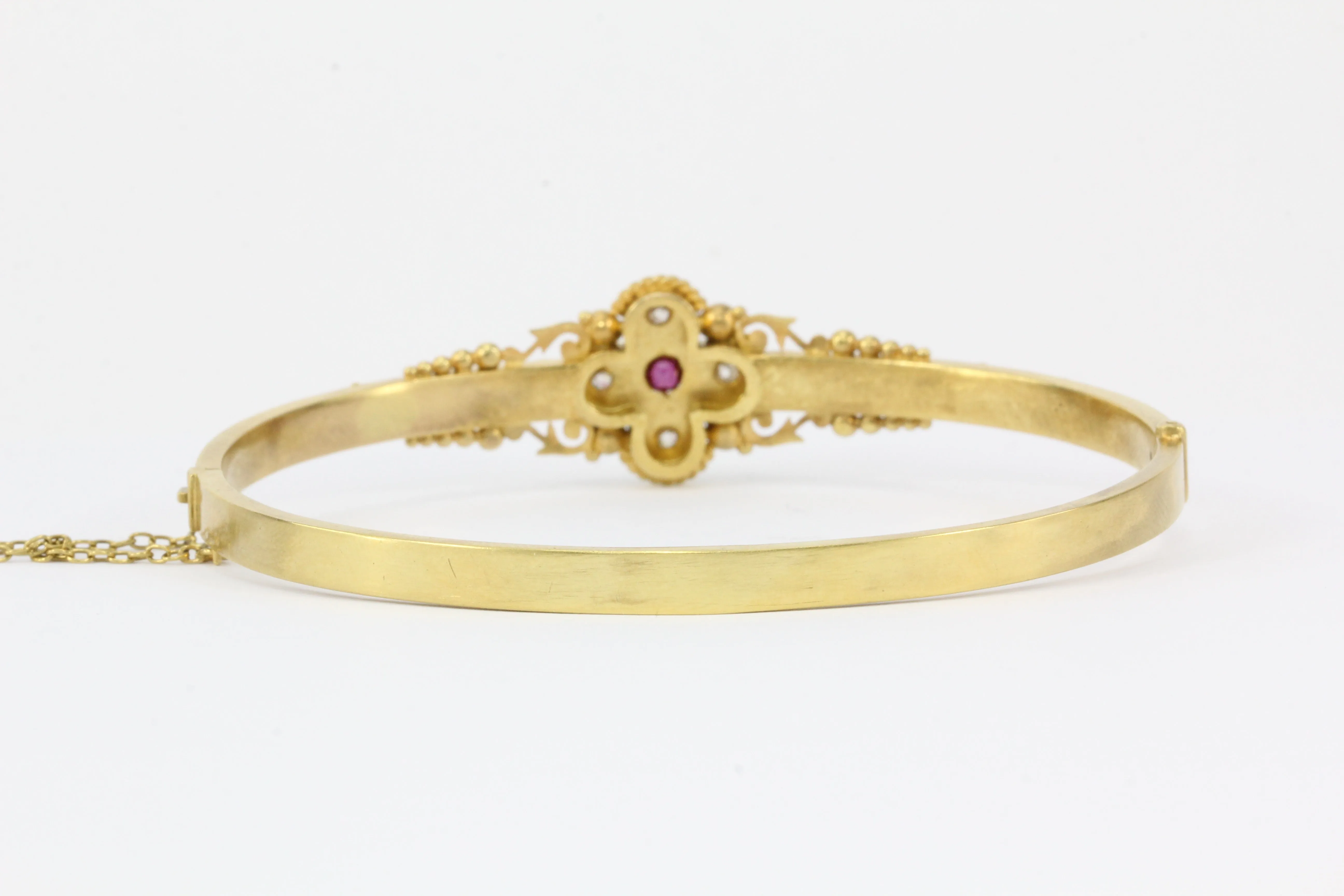 Victorian 15 CT Yellow Gold Ruby and Diamond Quatrefoil Motif Bangle Bracelet
