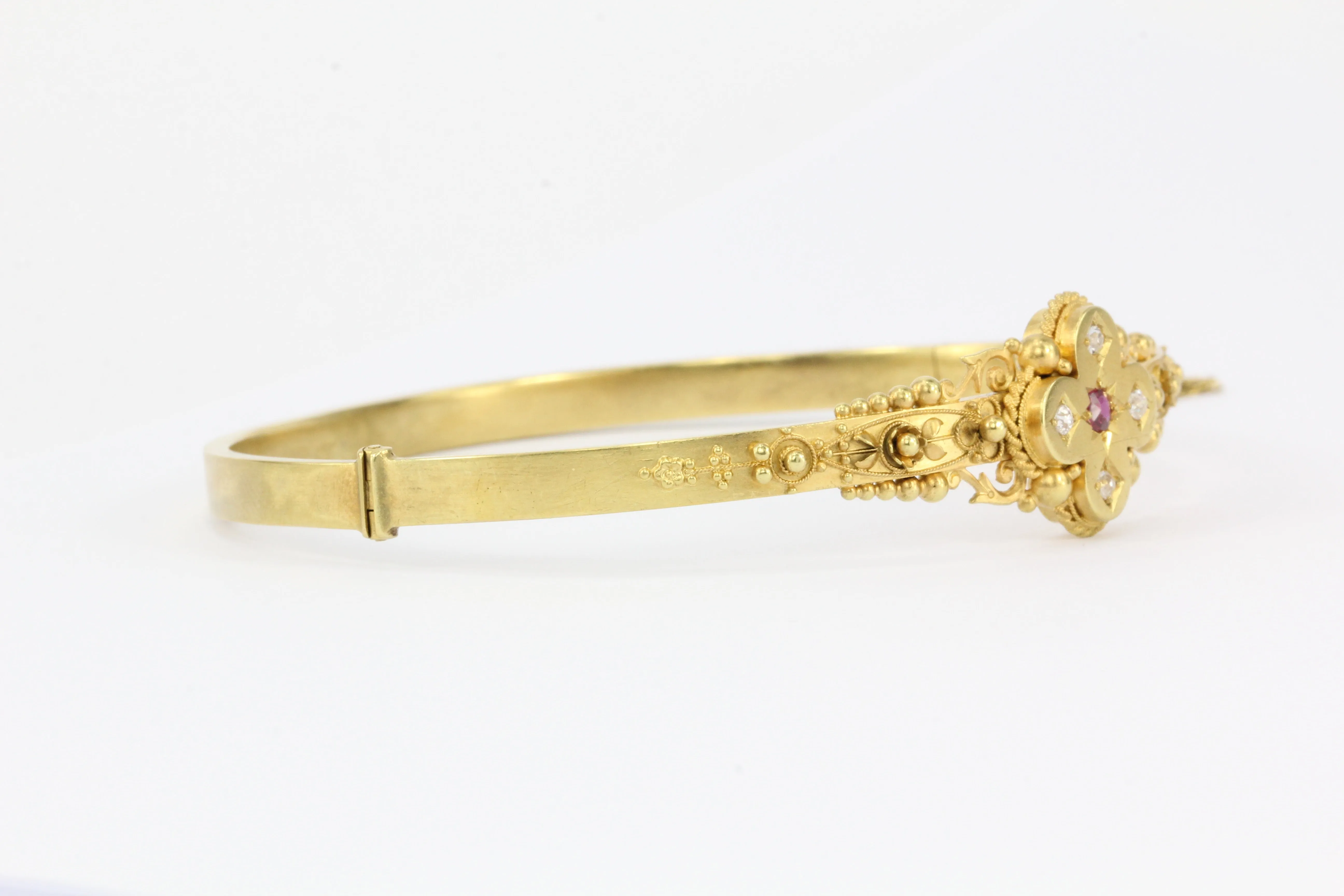 Victorian 15 CT Yellow Gold Ruby and Diamond Quatrefoil Motif Bangle Bracelet