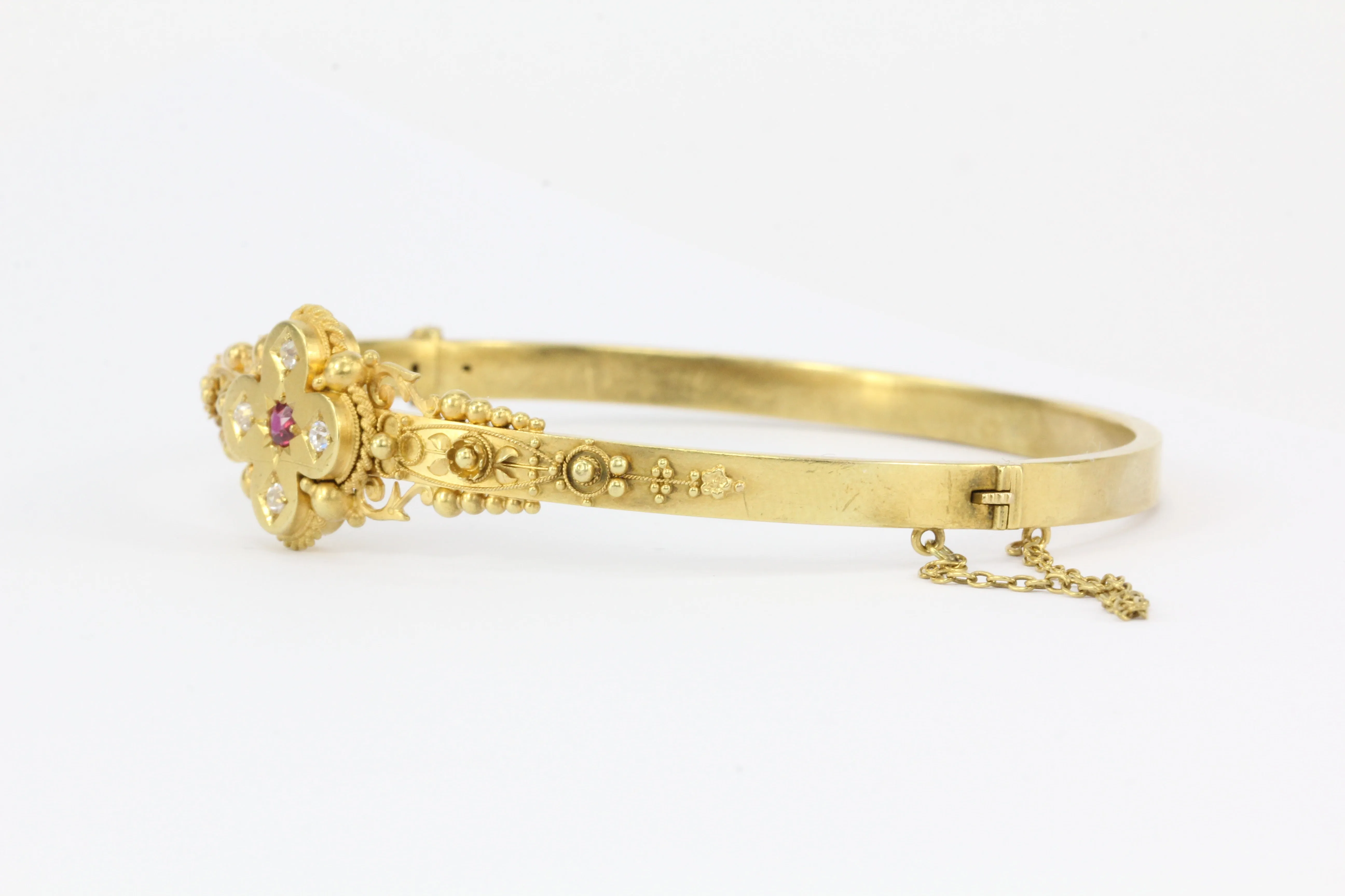Victorian 15 CT Yellow Gold Ruby and Diamond Quatrefoil Motif Bangle Bracelet