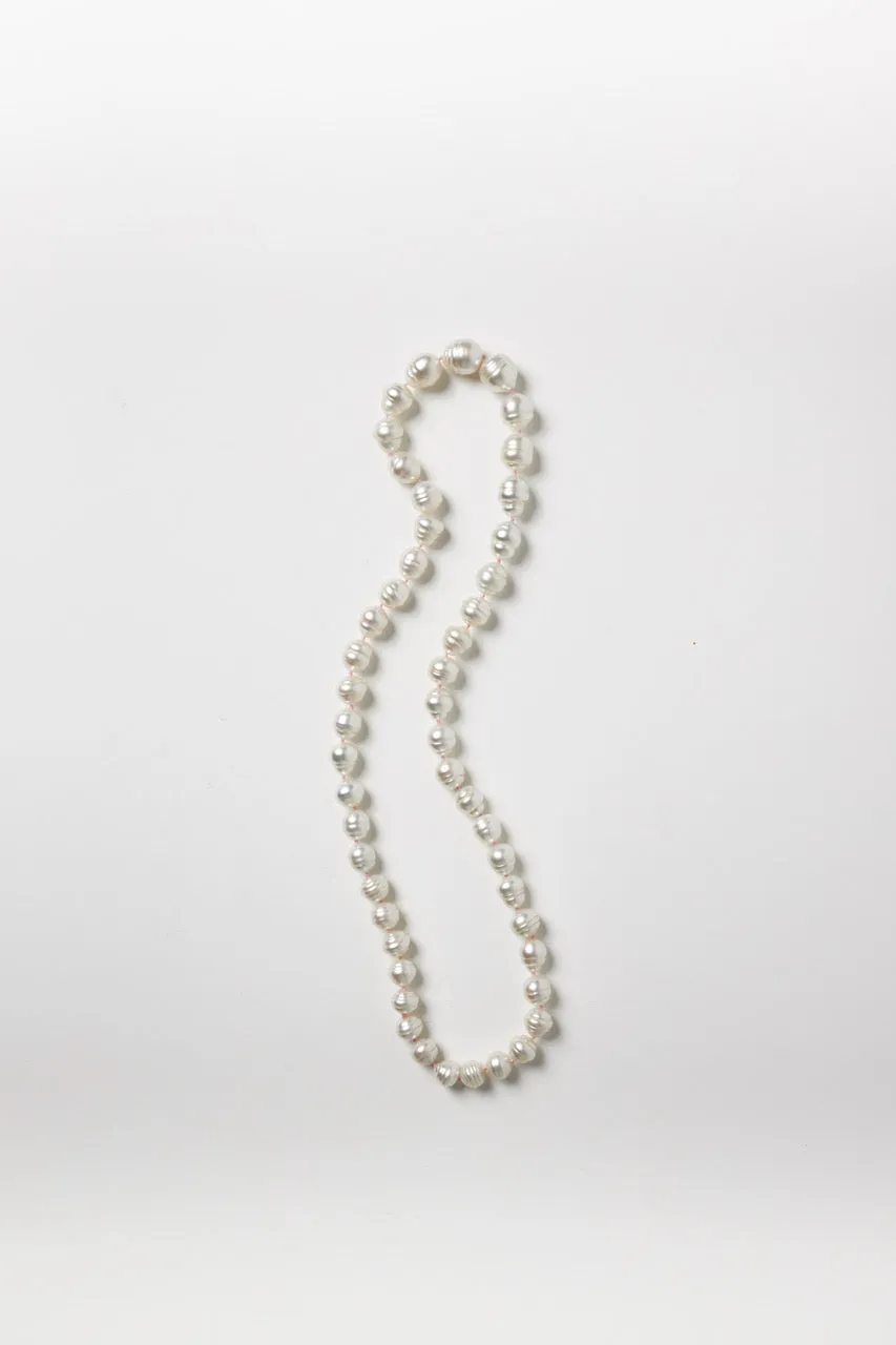 White Baroque Pearl Strand on Pink String